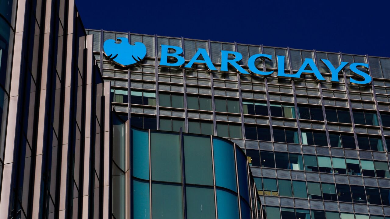 Signage hangs from Barclays head offices at the Canary Wharf business, financial and shopping district in London on March 21, 2017.