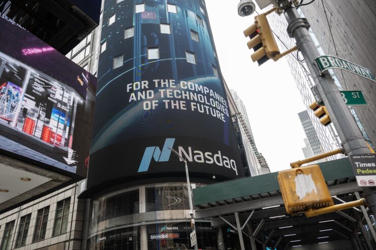 The Nasdaq MarketSite in New York, US, on Friday, June 30, 2023. The blowout rally in tech megacaps gained further traction on Friday, with the Nasdaq 100 poised to notch a record first-half of a year. Photographer: Victor J. Blue/Bloomberg