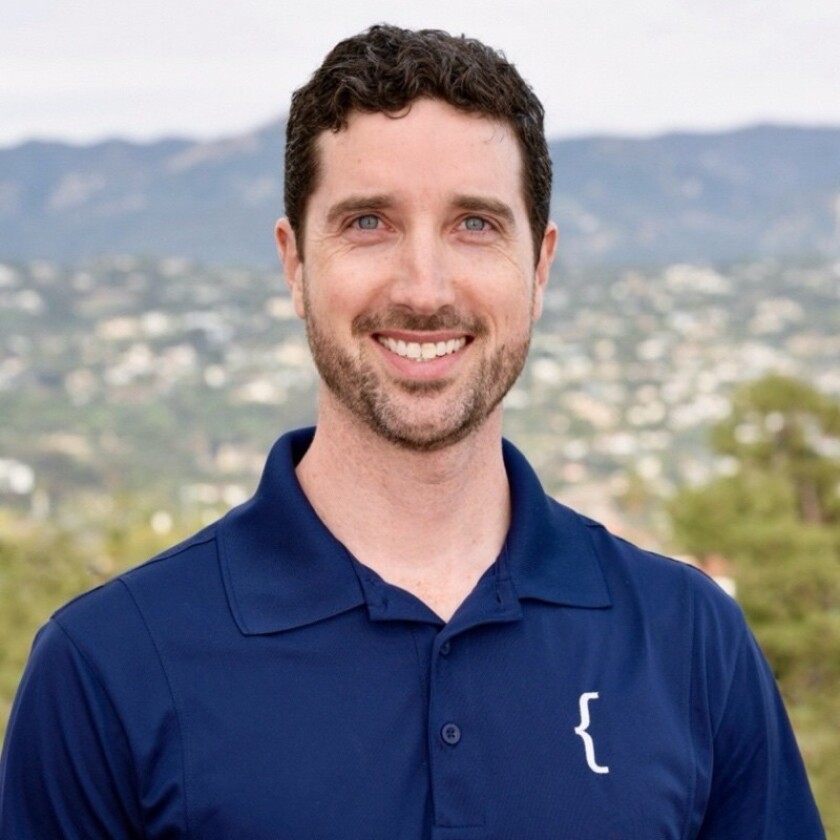 Headshot of Tom Rasmussen.