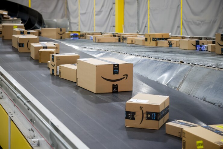 Amazon boxes moving on a conveyor belt