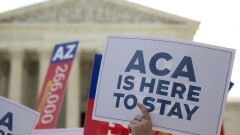 Demonstrators outside the Supreme Court in advance of the court's rulling that the ACA was constitutional