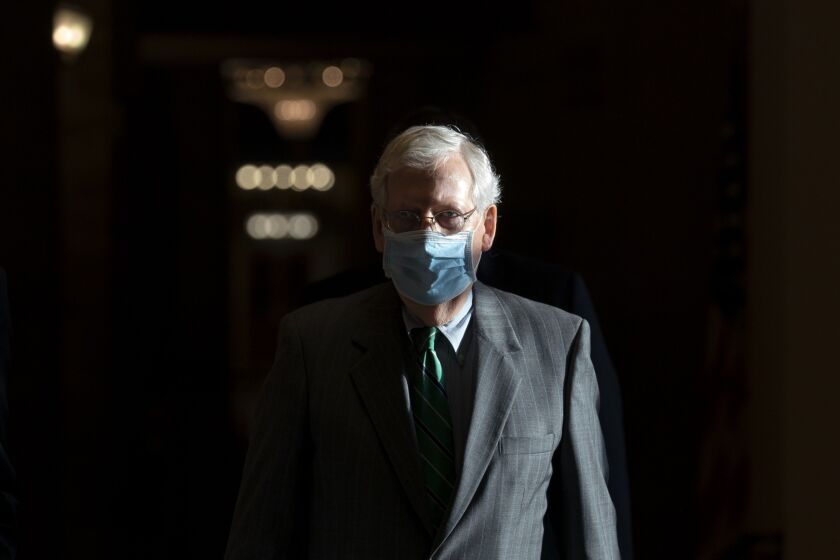 Mitch McConnell walks to the Senate Floor in Washington D.C.