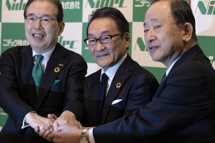 Shigenobu Nagamori, left, Mitsuya Kishida, center, and Hiroshi Kobe, in 2024.