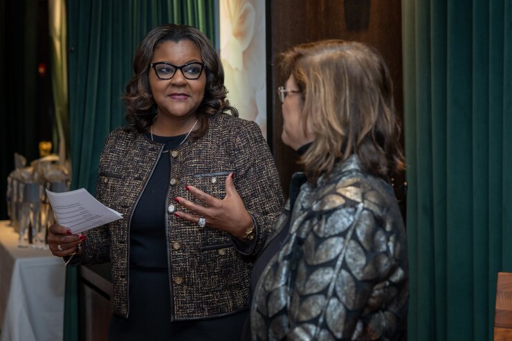 Donna Carr delivering her keynote address at the 2025 Women in Insurance Leadership luncheon.