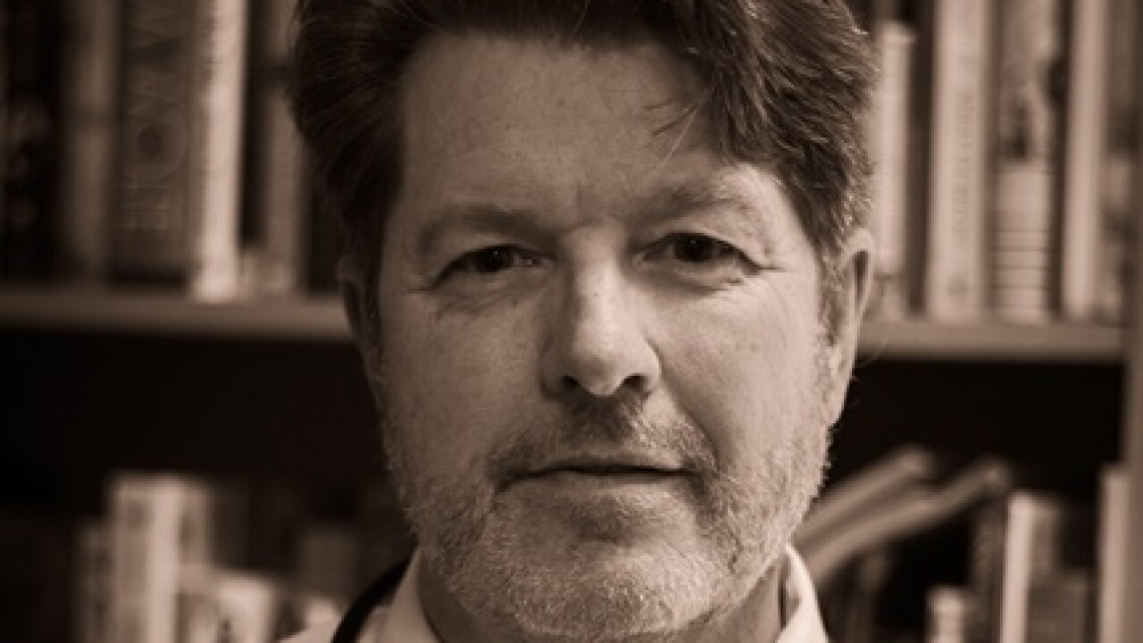 Headshot of John Alchemy, MD, QME