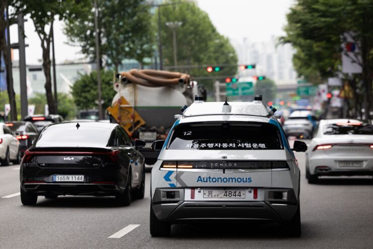 A Hyundai Motor Co. Ioniq 5 electric vehicle (EV) automotive robo-taxi travels on a road during an event in the Gangnam district of Seoul, South Korea, on Thursday, June 9, 2022. The level-4 "self-driving" technology was demonstrated during the event organized by the city of Seoul and South Korea's Ministry of Land, Infrastructure and Transport. Photographer: SeongJoon Cho/Bloomberg