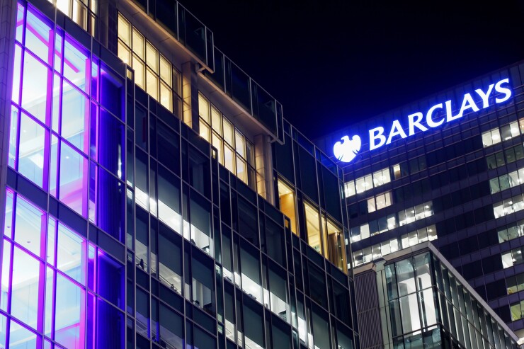 Barclays bank neon sign at night