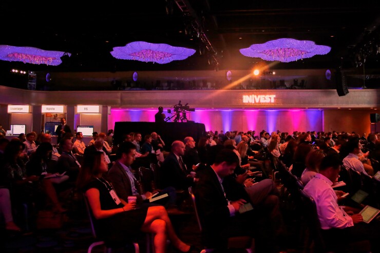Crowd at SourceMedia's InVest 2018 conference