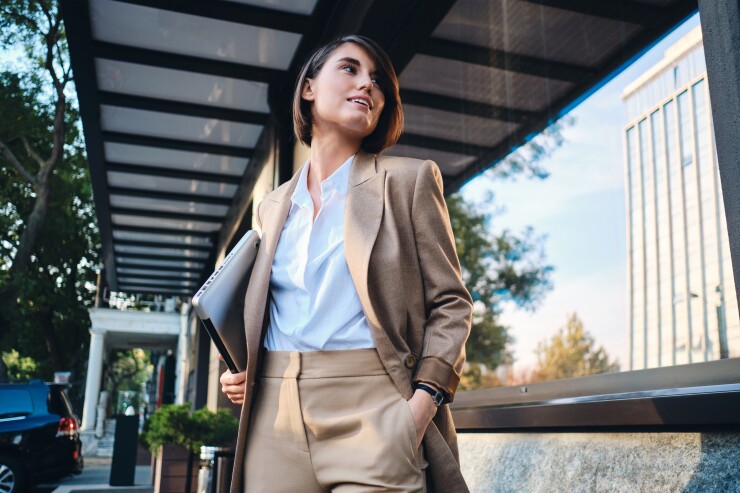 Business woman standing outside