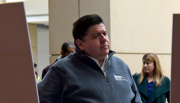 Illinois Governor J.B. Pritzker inspects the Army Corps of Engineers' transformation of McCormick Place in Chicago into a 3000 COVID19 patient bed alternate care facility on April 2, 2020.