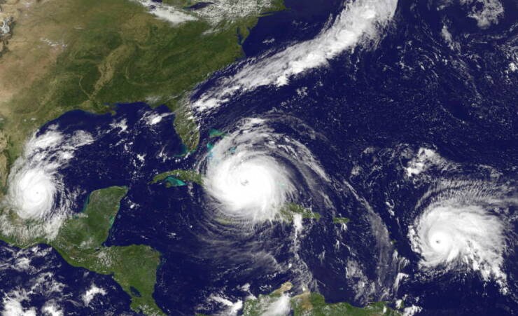 A satellite photo by NASA on Sept. 8 shows three hurricanes, Katia, Irma and Jose, headed toward the Caribbean and Gulf of Mexico.