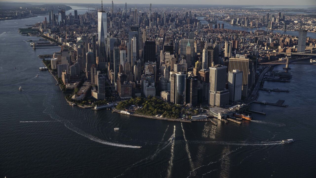 Buildings in lower Manhattan in New York, U.S., on Thursday June 17, 2021. New York state's pandemic mandates were lifted last week, after 70% of the adult population has now been given at least one dose of a coronavirus vaccine. Photographer: Victor J. Blue/Bloomberg