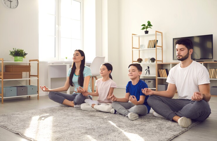 Family doing yoga together
