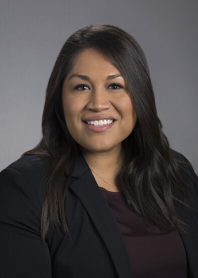 Copy of Ester Flores, director, Hilltop Securities.jpg