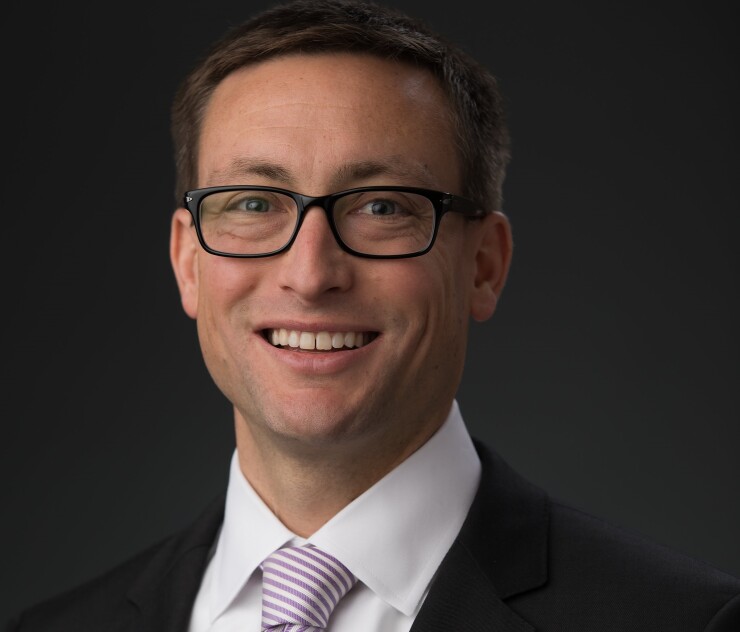 Kevin Bruegge Merrill Lynch advisor cropped 2019.jpg