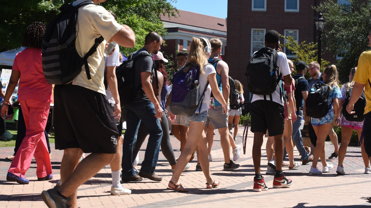 College students walking across campus