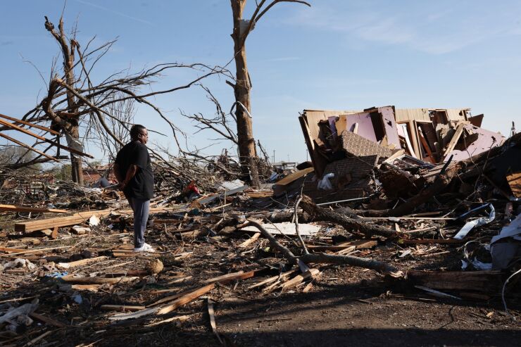 ROLLING FORK, MISSISSIPPI - MARCH 26: Cornelius Williams looks at what remains of the home in which he grew up after it was hit on Friday evening by an EF-4 tornado on March 26, 2023 in Rolling Fork, Mississippi. At least 26 people died when the tornado ripped through the small town and other nearby communities. (Photo by Scott Olson/Getty Images)
