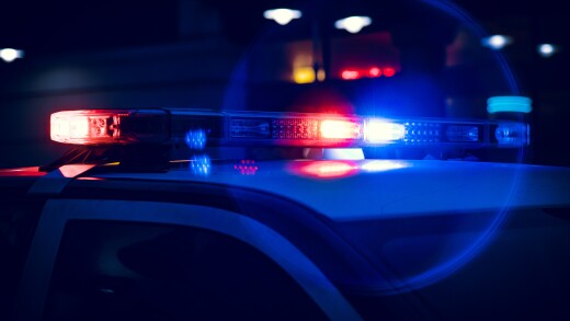 Closeup of Police Lights on Dark Street at Night