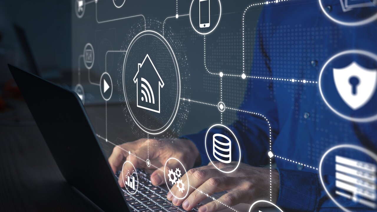 Connections and smart home technology with devices and computers connected on internet and local network, person configuring data communication and digital information security on laptop