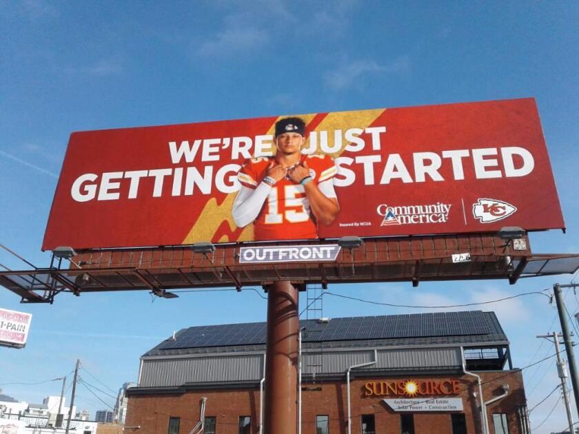 A CommunityAmerica Credit Union billboard featuring Kansas City Chiefs star Patrick Mahomes. CACU became the team's official banking sponsor in 2019.