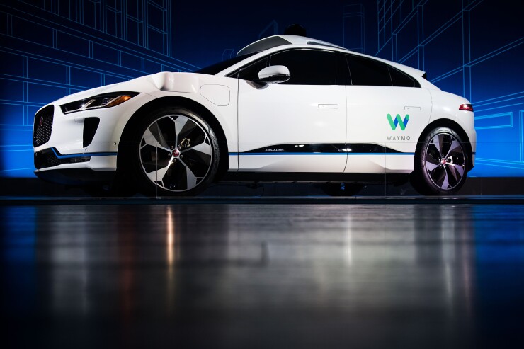 The Jaguar I-Pace with Waymo autonomous electric vehicle (EV) is unveiled during an event in New York, U.S., on Tuesday, March 27, 2018. Waymo is teaming up with Jaguar Land Rover on autonomous vehicles,