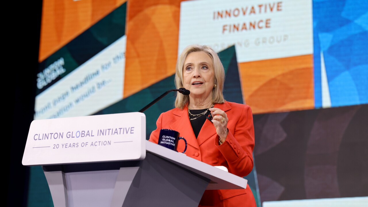 Hillary Clinton standing at a podium speaking during the Clinton Global Initiative 2025 Annual Meeting in New York City.