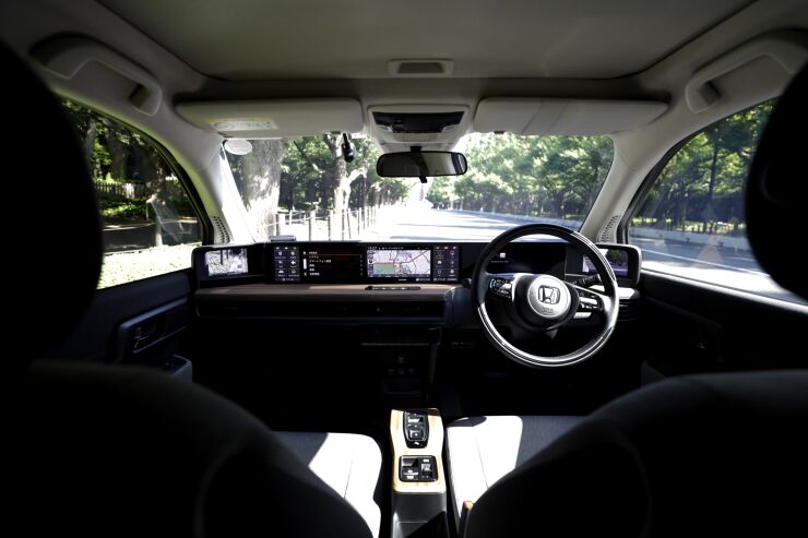 The interior of a Honda Motor Co. e electric vehicle during a test drive in Tokyo, Japan, on Thursday, June 17, 2021. Honda has become the first of Japan’s automakers to state publicly it will phase out sales of gasoline-powered cars completely, setting 2040 as the goal and giving newly minted Chief Executive Officer Toshihiro Mibe a once-in-a-career chance to put his stamp on a firm that can trace its lineage back 84 years. Photographer: Kiyoshi Ota/Bloomberg