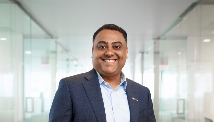 Ankit Bhatt, U.S. Bank, standing in hallway