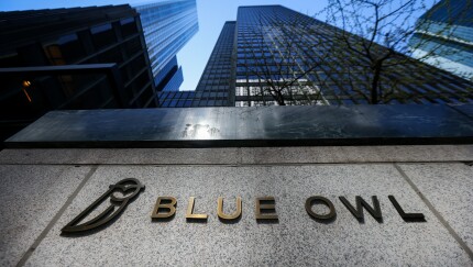 A picture of the Blue Owl signage outside its office in New York