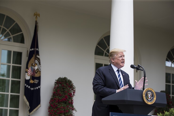 President Donald Trump speaks at a press conference in May.