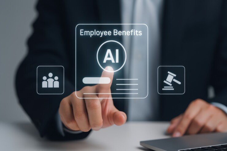 A man touching a screen that says "Employee Benefits AI."
