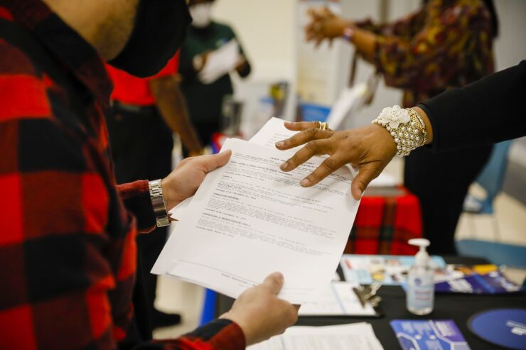 Job Seekers Attend A Miami-Dade County Career Fair