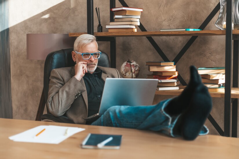 Workplace procrastination. Old rich wealthy man