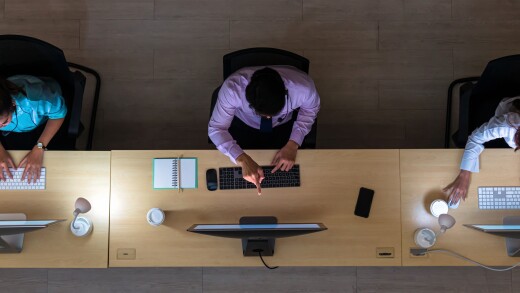 Top view of Asian Male customer care service working hard late i