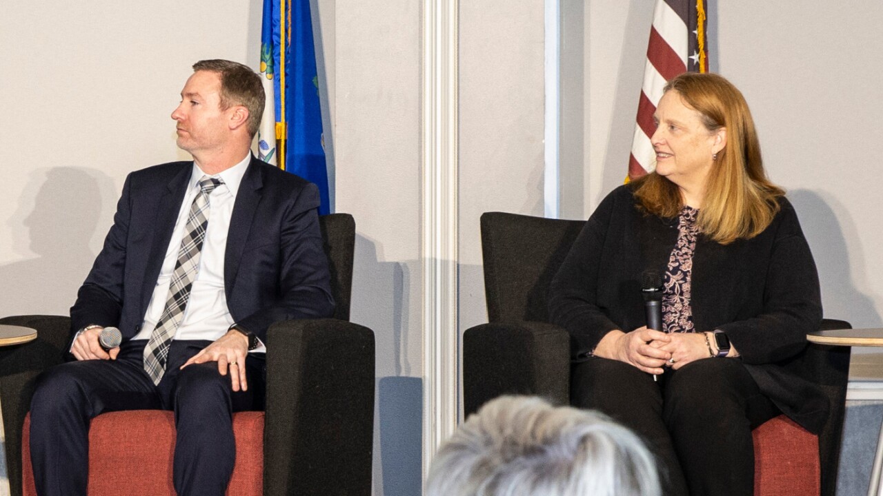 Steve Brunner and Christine Conrad on a stage
