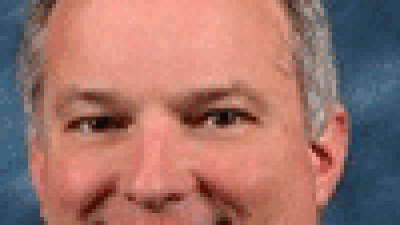 mike-rowell100x133.gif