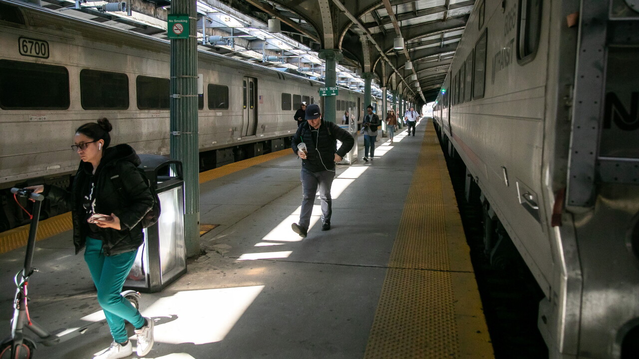 New Jersey transit trains and passengers in a station