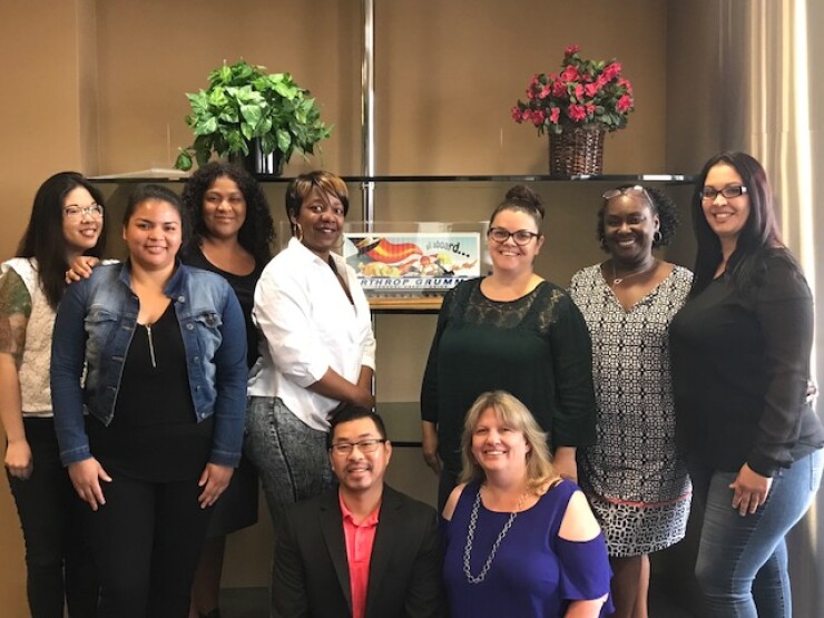 Members of the Northrop Grumman FCU lending team.