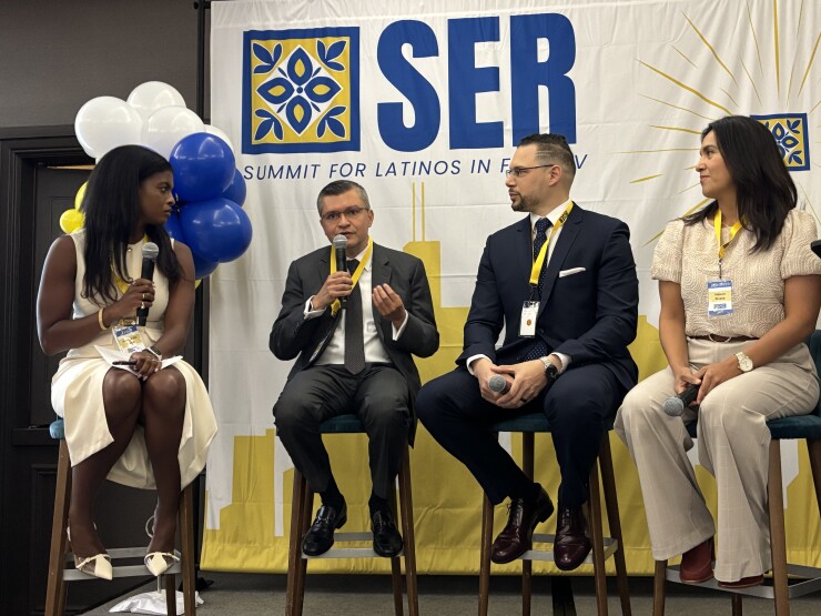From left to right, Anna N'Jie-Konte of Poder Wealth Advisors, Freddy Garcia of Left Brain Wealth Management, Luis Rosa of Build a Better Financial Future and Valerie Rivera of FirstGen Wealth spoke in a panel at this week's SER Summit for Latinos in Financial Services outside Chicago.