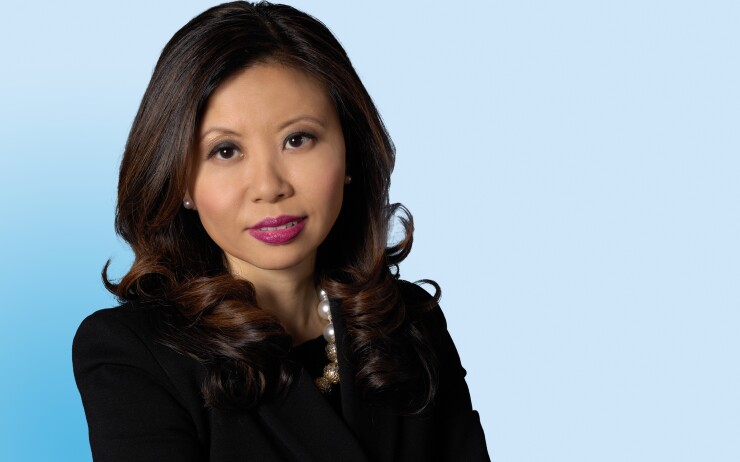 It's important to "help other women along the way and empower them, especially mentoring younger women," says Alger SVP Amy Zhang.