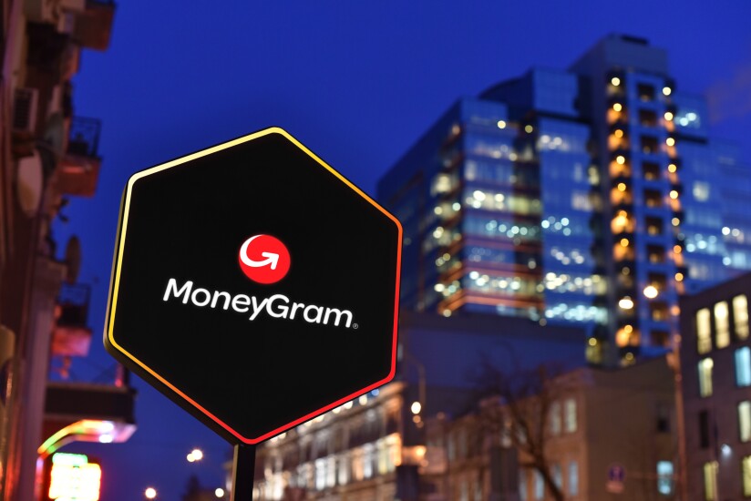 MoneyGram sign at night