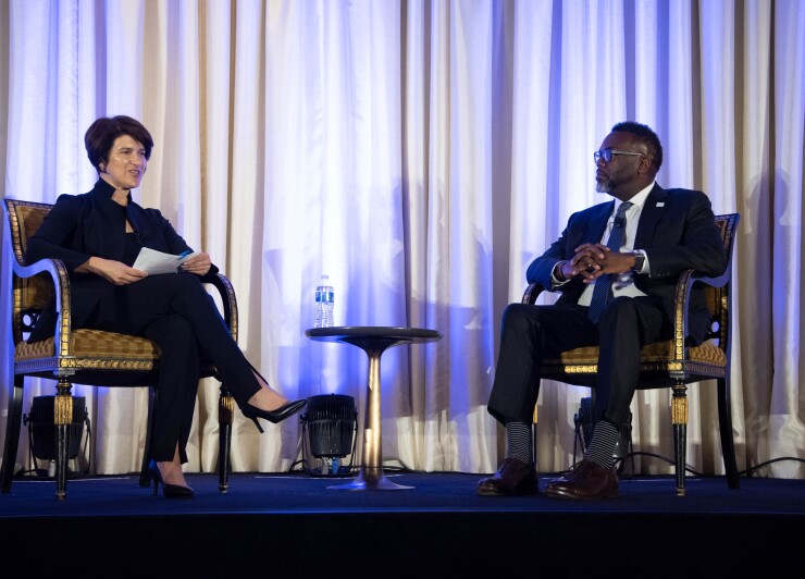 Chicago Mayor Brandon Johnson and CFO Jill Jaworski speak during a fireside chat at the Bond Buyer's second annual infrastructure conference on Sept. 13.