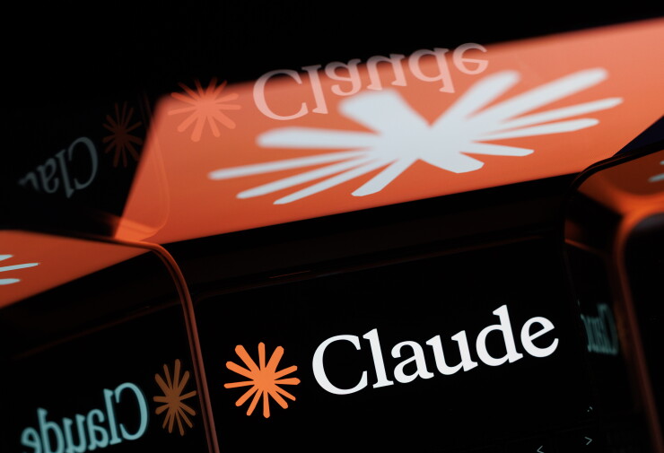 A phone displayed the logo of Anthropic's Claude large language models this past summer. Last week, Anthropic and more than a dozen industry collaborators unveiled Claude for Financial Advisors.