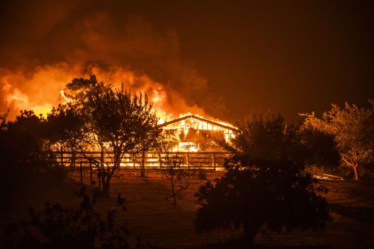 A home burns during the Hennessy fire in Solano County, California, in August 2020.