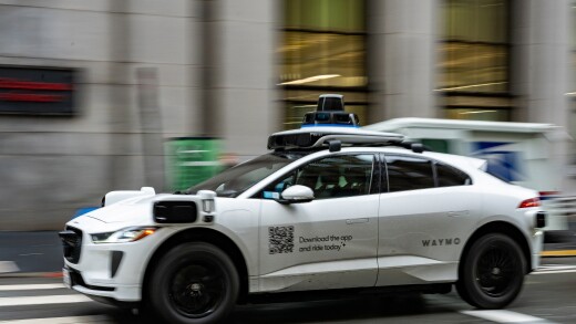 Waymo vehicle driving on San Francisco street