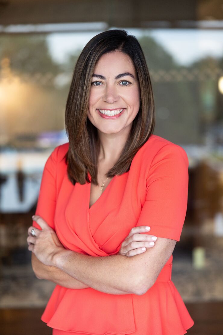 Lindsay Taylor is a partner with St. Louis-based Moneta Group Investment Advisors.