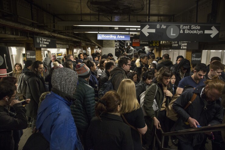 crowded NYC subway platform
