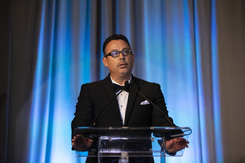 Michael Discenza accepts the P3 award