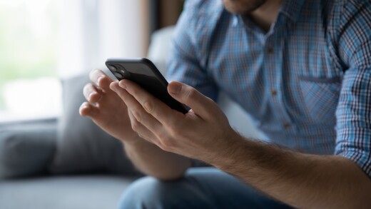 Man looking at cell phone