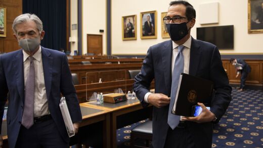 Treasury Secretary Steven Mnuchin, right, sent a letter to Fed Chair Jerome Powell Monday approving the extension of the programs.